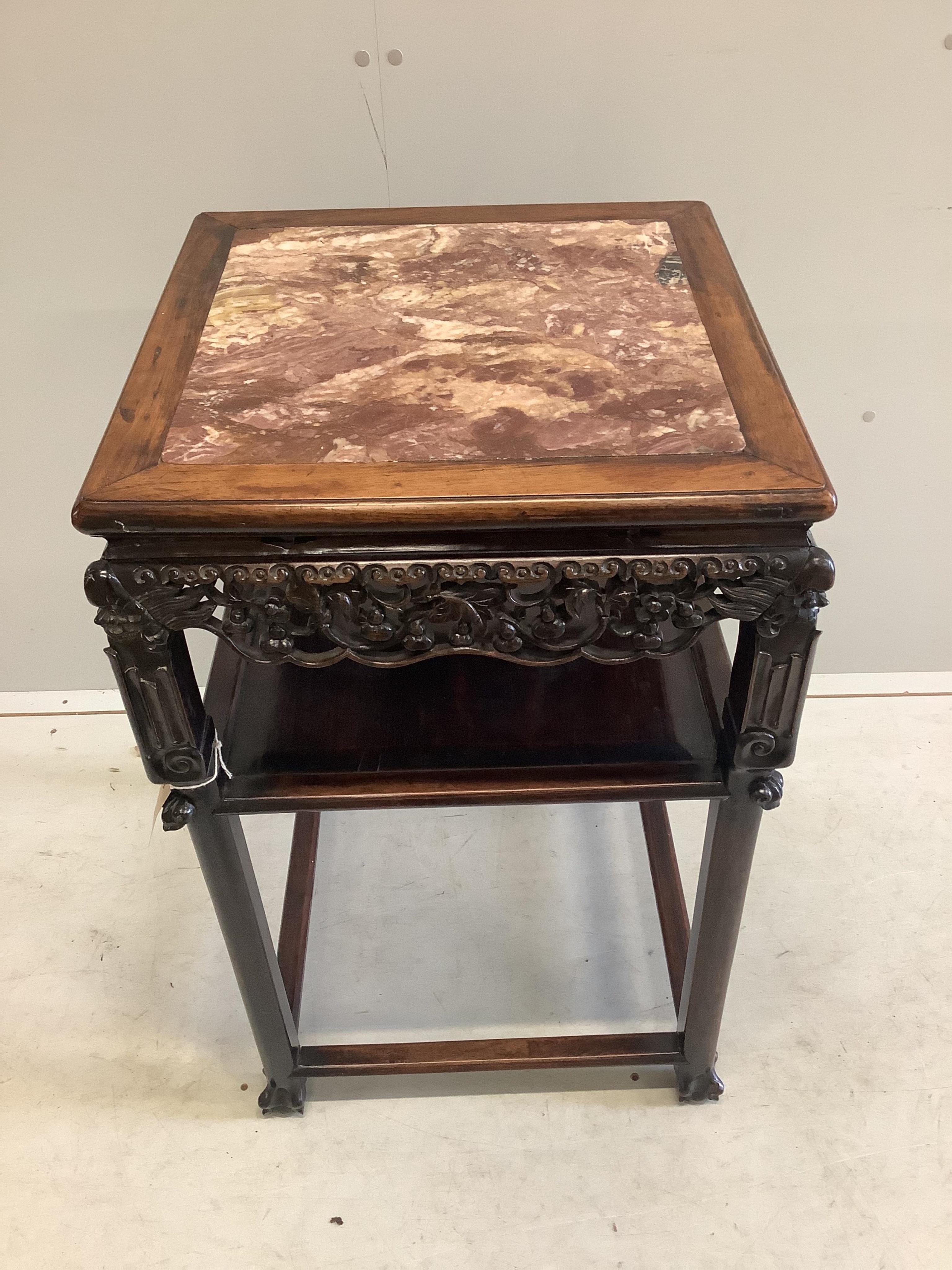 A Chinese hardwood two tier vase stand with inset marble top, width 49cm, depth 48cm, height 82cm. Condition - fair